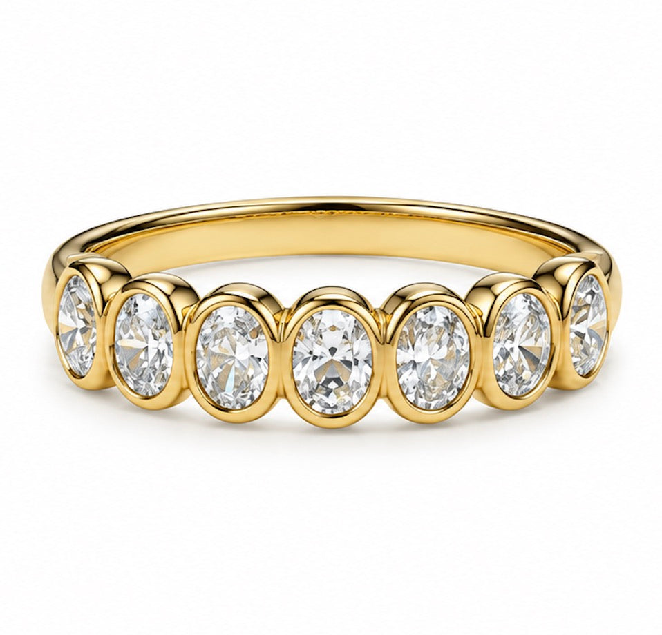 18K OVAL BEZEL HALF-ETERNITY BAND 0.7CT TOTAL