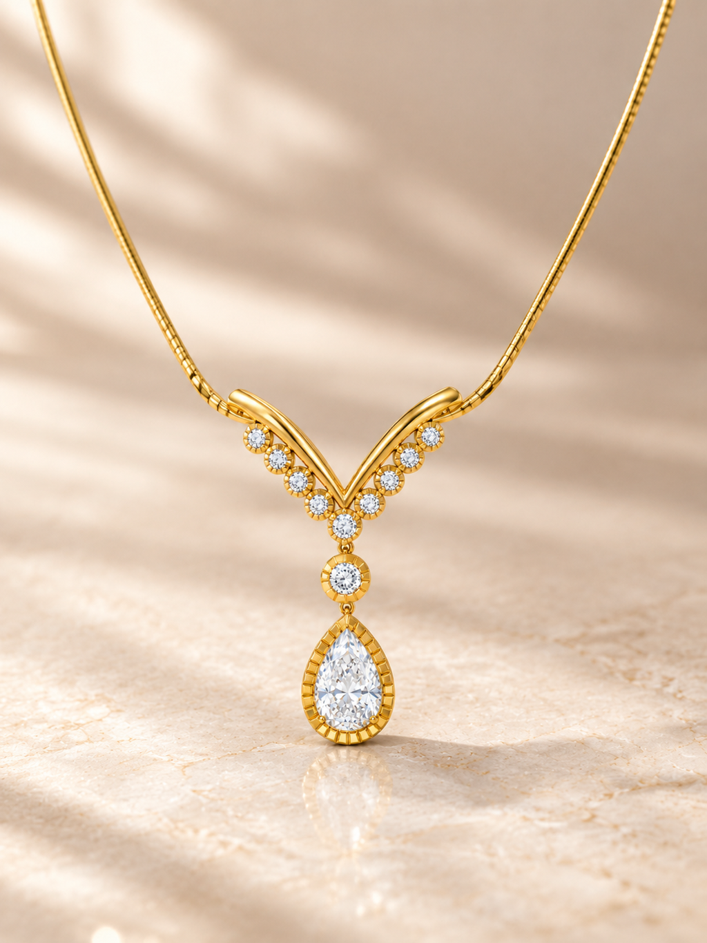 PEAR/5 CT /14k YELLOWGOLD/V-SHAPED DROP NECKLACE, lifestyle view