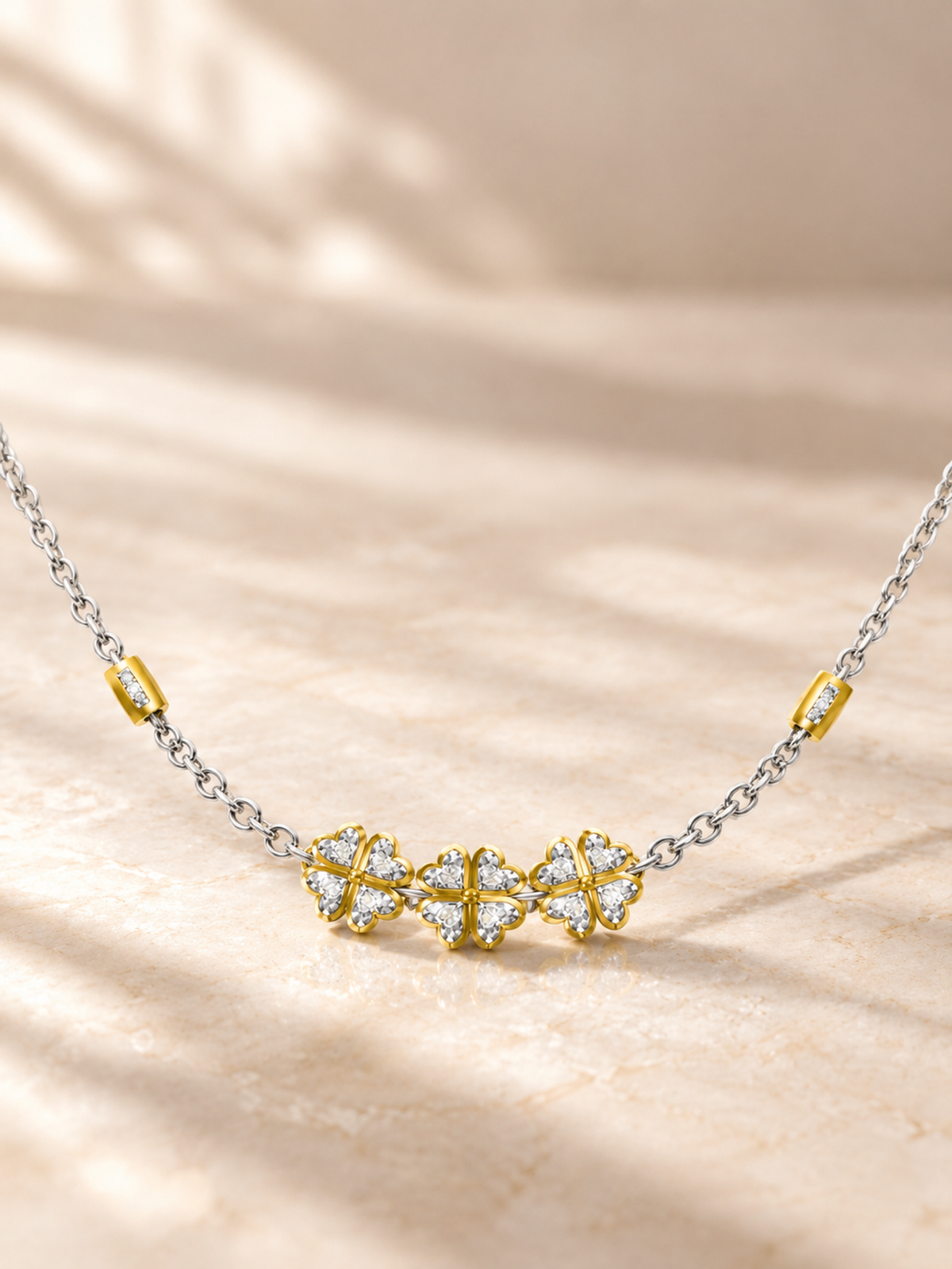 ROUND/14k TWO-TONE/TRIPLE CLOVER NECKLACE, lifestyle view