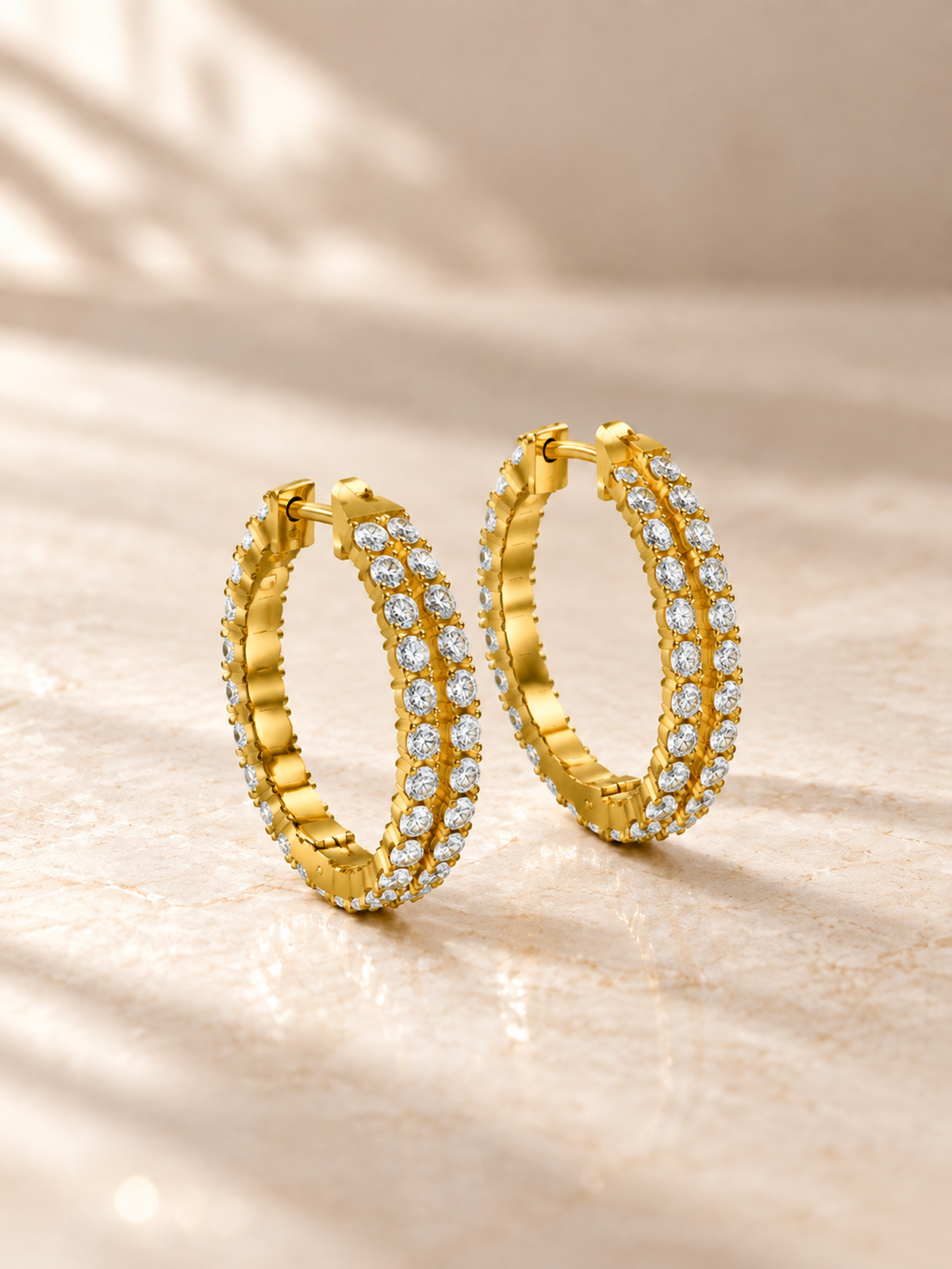 ROUND/14k YELLOWGOLD/SHARED PRONG HOOP EARRINGS, lifestyle view