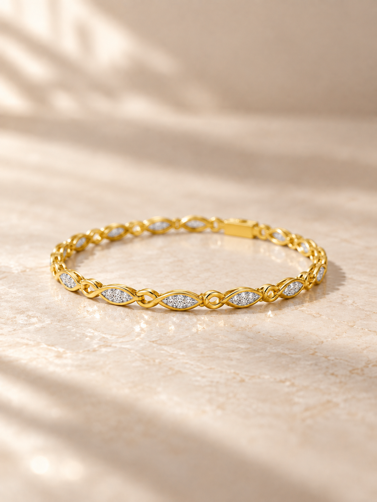 ROUND/14k YELLOWGOLD/INFINITY LINK BRACELET, lifestyle view